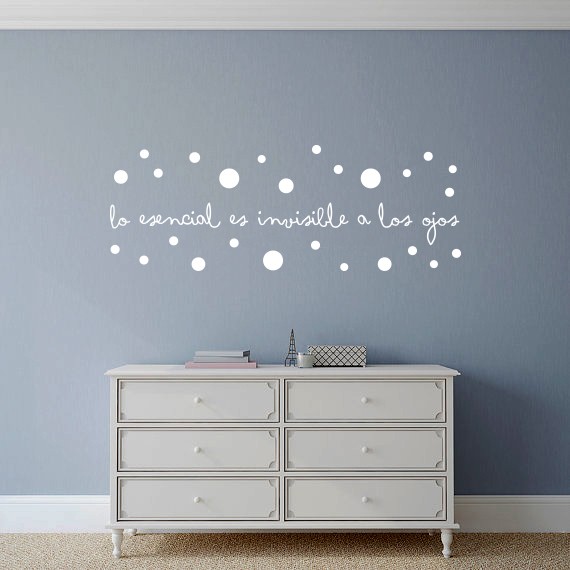 Texto "Lo Esencial..." con topos